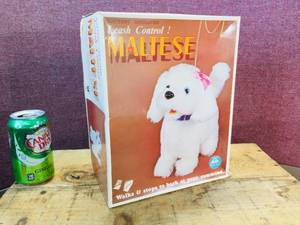 lot 57 image: Vintage ALPS Maltese Battery Operated Toy