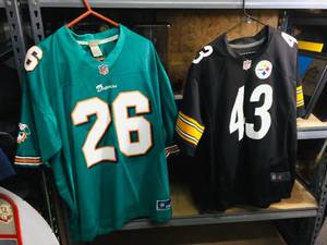 lot 95 image: Steelers - DolphinsPolamalu - Miller Jerseys
