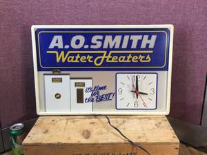 lot 204 image: Vintage A.O. Smith Water Heaters Light-Up SignClock