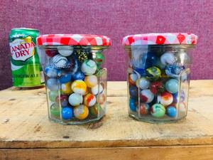 lot 72 image: 2 Jars Vintage Marbles