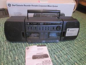 (R2) GE Portable Compact Music System with Dual Cassette Recorder and AMFMFM Stereo Radio with Box
