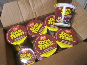 lot 18 image: Case of 12 Cocoa Pebbles Cereal Single Serves Best by June 2024