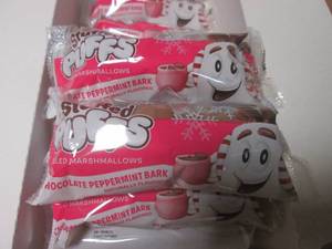 lot 28 image: Case of 48  2-Packs Stuffed Puffs Chocolate Peppermint Bark Filled Marshmallows 4 Inner Boxes of 12  2-Packs Past Date