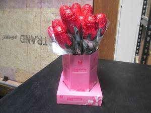 lot 47 image: 16 Chocolatey Roses Display Best by May 2024