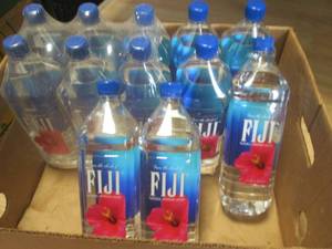 lot 55 image: 12 Bottles Fiji Natural Artesian Water 1.5 Liter Bottles Past Date