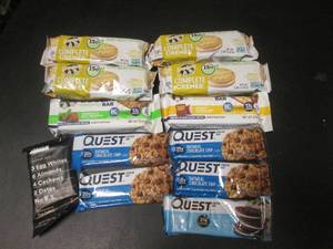 lot 182 image: 12 Assorted Protein Bars and Cookies Past Date