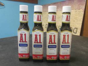 lot 211 image: 4 Bottles of A1 Original Sauce 5oz Bottles Best by June 2025