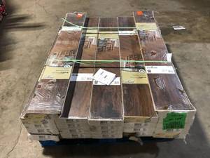 20 Boxes of TrafficMaster Saratoga Hickory 7 mm T x 7.6 in. W Laminate Wood Flooring (24.2 sqftcase)  Customer Returns See Pictures