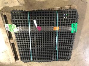 lot 13 image: 9 Pieces of  TrafficMaster Black 36 in. x 36 in. Rubber Anti-Fatigue Comfort Mat Customer Returns See Pictures