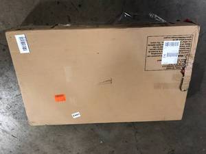 lot 38 image: Alaterre Furniture Country Cottage 42 in. White Large Rectangle Wood Coffee Table with Shelf   Customer Returns See Pictures