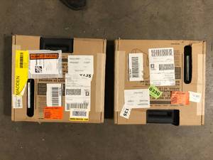 lot 41 image: Lot of 2 MTD Genuine Factory Parts Additional 42 lbs. Suit case Weight for Lawn Tractors with the Rear-Mounted Weight Bracket Kit  Customer Returns See Pictures