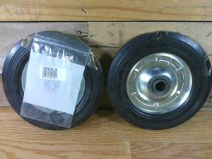 lot 42 image: Pair of 2 Free Wheels- 8 Diameter 1 Axel- with C Rings