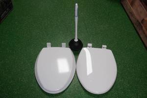 lot 121 image: 2 Elongated Toilet Seats with Plunger