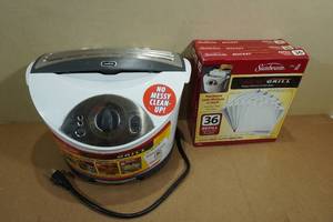 lot 210 image: Sunbeam Rocket Grill with 3 Packs of Refill Parchment Pouches
