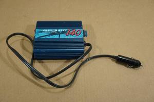 lot 238 image: Portawattz 140 Watt DC to AC Power Inverter