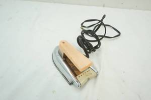lot 94 image: Vintage Nassau kids electric iron