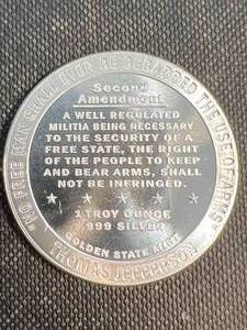 lot 17 image: 1 TROY OZ .999 FINE SILVER 2ND AMENDMENT ROUND