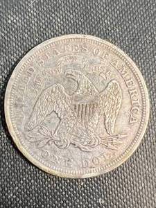 lot 32 image: 1871 US SEATED DOLLAR XF