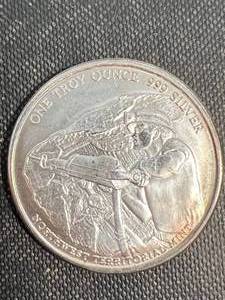 lot 42 image: 1 TROY OZ .999 FINE SILVER NW TERRITORIAL MINT ROUND
