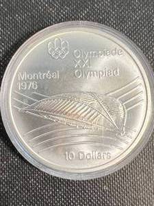 lot 43 image: 48.6 GRAMS 925 SILVER CANADIAN ROUND 1976 MONTREAL OLYMPICS