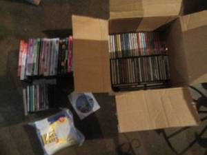 lot 126 image: Variety of DVDS and CDS to add to your collection