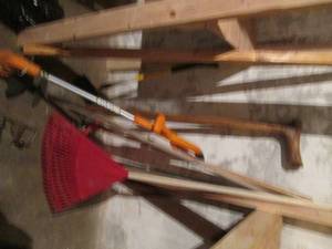 lot 130 image: Wizard like walking stick and landscaping tools for outside your home