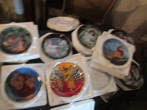 lot 148 image: Disneys Lion King and Little Angels decorative wall plates