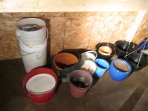 lot 75 image: Hanging planters, outdoor planters and supplies