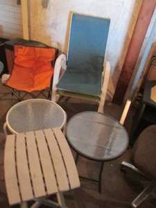 lot 84 image: Pair of Metal framed outdoor rocking chairs and side tables plus a folding chair and side table