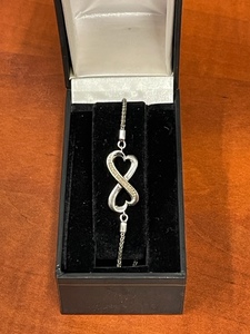 lot 24 image: .925 Sterling Silver Heart Shape Eternity Bracelet in Gift Box