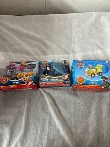 lot 16 image: 3 Paw Patrol Toys