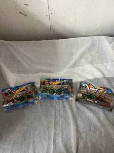 lot 21 image: 3 Monster Truck Toy Cars