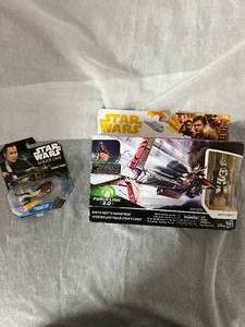 lot 30 image: Star Wars Hot Wheels Car and Star Wars Force Enfys Nest Bike with Action Figure