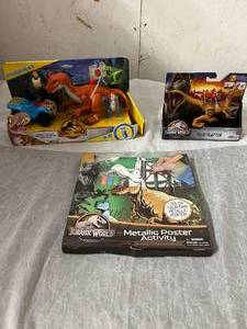 lot 32 image: 2 Jurassic World Toys and 1 Coloring Set