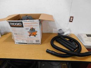 lot 16 image: RIDGID 6 Gallon 3.5 Peak HP NXT WetDry Shop Vacuum with Filter, Hose, Wands, Utility Nozzle