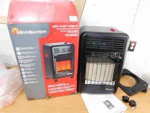 lot 25 image: Mr. Heater 18,000 BTU Cabinet Propane Space Heater with Hose and Regulator