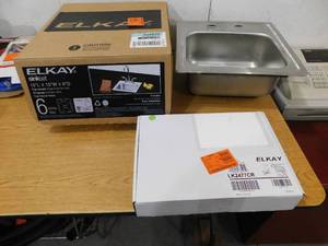 lot 31 image: All in one. Elkay 15 in. Drop-in Single Bowl 20 Gauge Stainless Bar Sink with Faucet and Strainer Basket