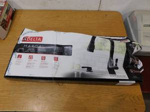lot 32 image: Delta Marca Single-Handle Pull-Down Sprayer Kitchen Faucet with ShieldSpray Technology in Matte Black