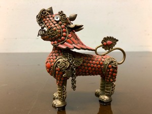 lot 11 image: Smaller Vintage Tibetan Brass & Red Coral Inset Foo Dog 