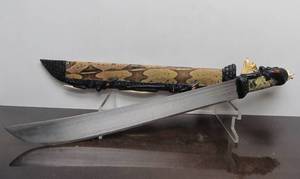 lot 55 image: Vintage South American Hunting Machete wGenuine Pirahna Head