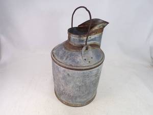 lot 4 image: Antique Phillips 66 Five Gallon Measuring Oil Can