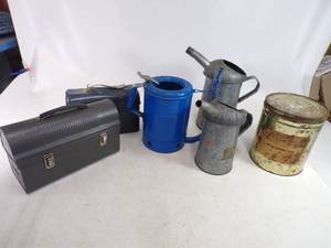 lot 40 image: Vintage  Oil Cans, Lunch Boxes, & Urinal Cakes