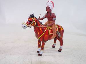 lot 104 image: Rare Mikuni Tin Toy Native American on Horse Wind up Toy
