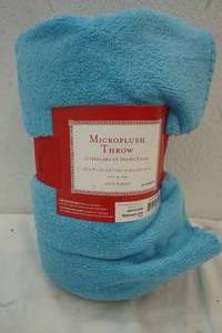 lot 32 image: New Micro plush light blue throw blanket