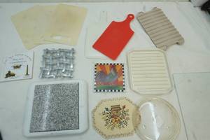 lot 76 image: Variety Cutting Boards, microwave bacon pans,5 hot pads