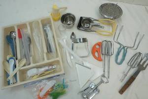 lot 92 image: Silverware, tray, measuring cups and spoons and other