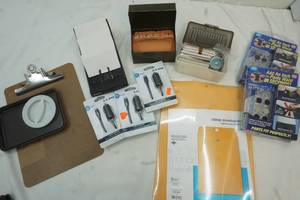 lot 100 image: Rolodex, pants fit items and car chargers