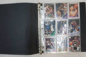 lot 107 image: Various NBA and NFL cards