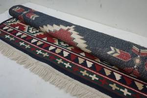 lot 143 image: Southwestern rug