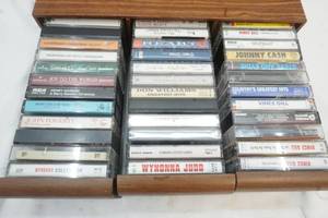 lot 334 image: Variety of Cassette Tapes in Case Holder